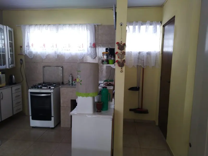 Foto 14 de Casa com 2 quartos à venda, 123m2 em Tramandai - RS