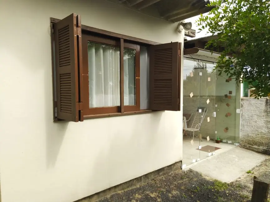 Foto 11 de Casa com 2 quartos à venda, 123m2 em Tramandai - RS