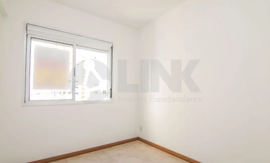 Foto 2 de Apartamento com 2 quartos à venda, 65m2 em Santo Antônio, Porto Alegre - RS