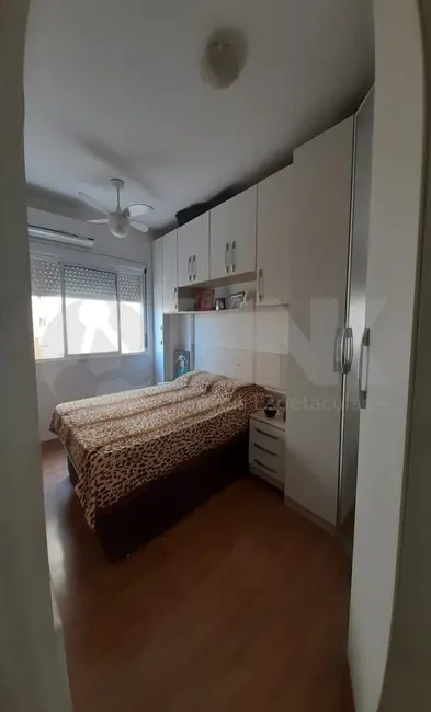 Apartamento com 3 quartos à venda, 66m2 em Santo Antônio, Porto Alegre - RS - imagem 6 Foto 6 de Apartamento com 3 quartos à venda, 66m2 em Santo Antônio, Porto Alegre - RS