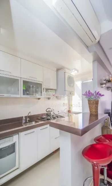 Foto 7 de Apartamento com 3 quartos à venda, 66m2 em Santo Antônio, Porto Alegre - RS