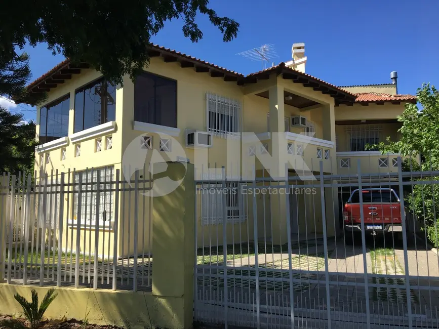 Foto 1 de Casa com 6 quartos à venda, 480m2 em Passo da Areia, Porto Alegre - RS