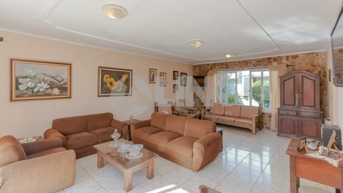 Foto 1 de Casa com 4 quartos à venda, 255m2 em Chácara das Pedras, Porto Alegre - RS