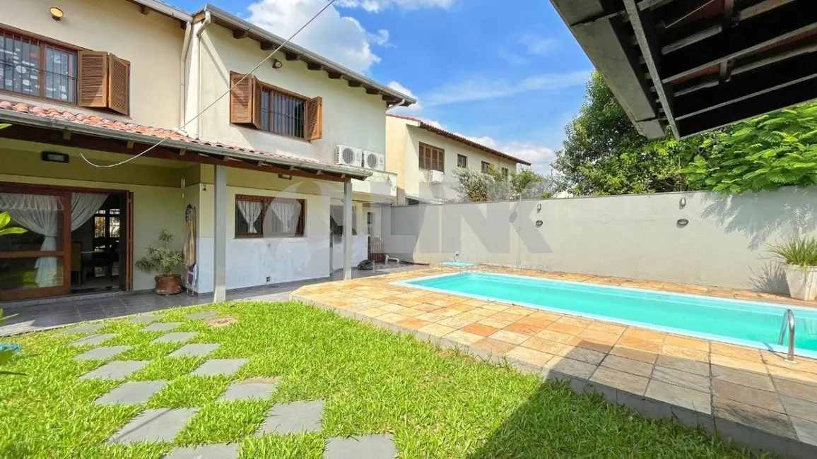 Foto 2 de Casa com 3 quartos à venda, 375m2 em Jardim Itu, Porto Alegre - RS