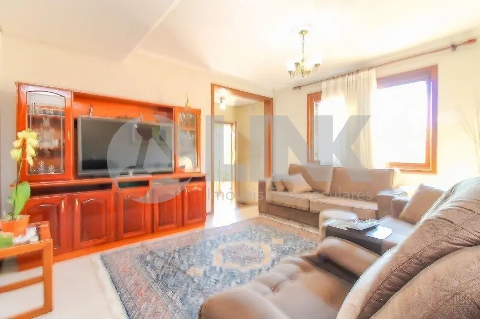 Foto 1 de Casa com 5 quartos à venda, 192m2 em Passo da Areia, Porto Alegre - RS