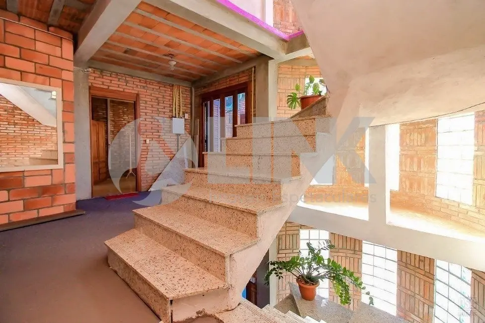Foto 1 de Casa com 5 quartos à venda, 600m2 em Jardim Leopoldina, Porto Alegre - RS