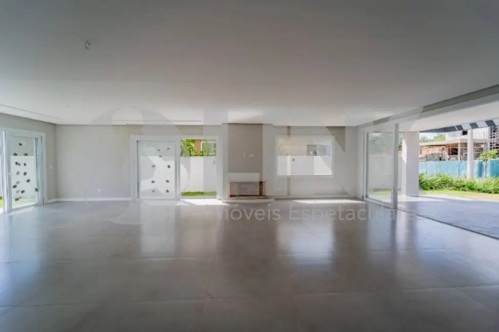 Foto 6 de Casa de Condomínio com 3 quartos à venda, 300m2 em Vila Nova, Porto Alegre - RS