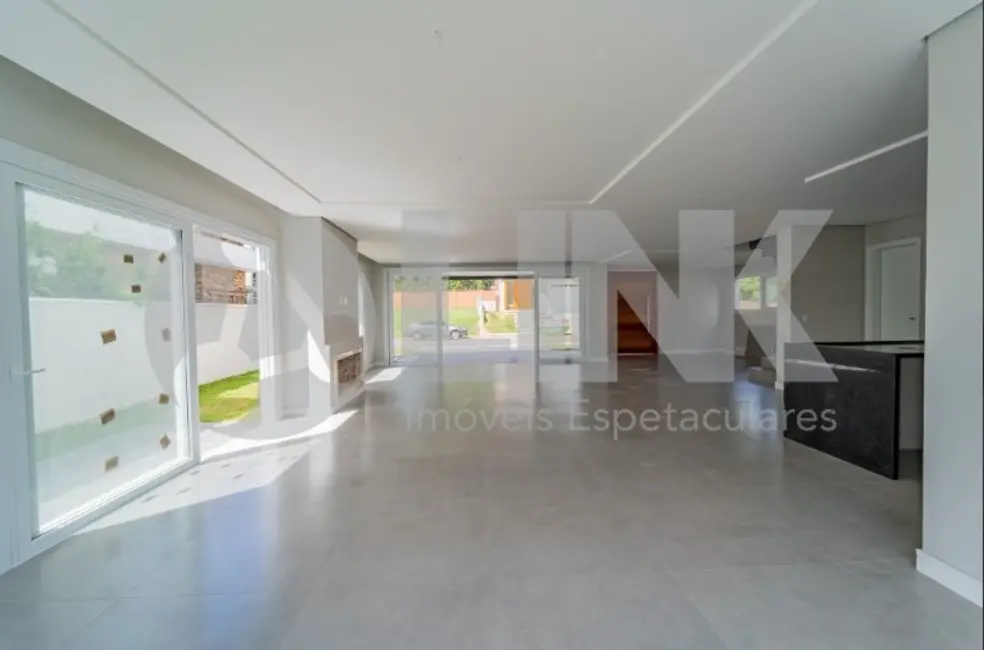 Foto 2 de Casa de Condomínio com 3 quartos à venda, 300m2 em Vila Nova, Porto Alegre - RS