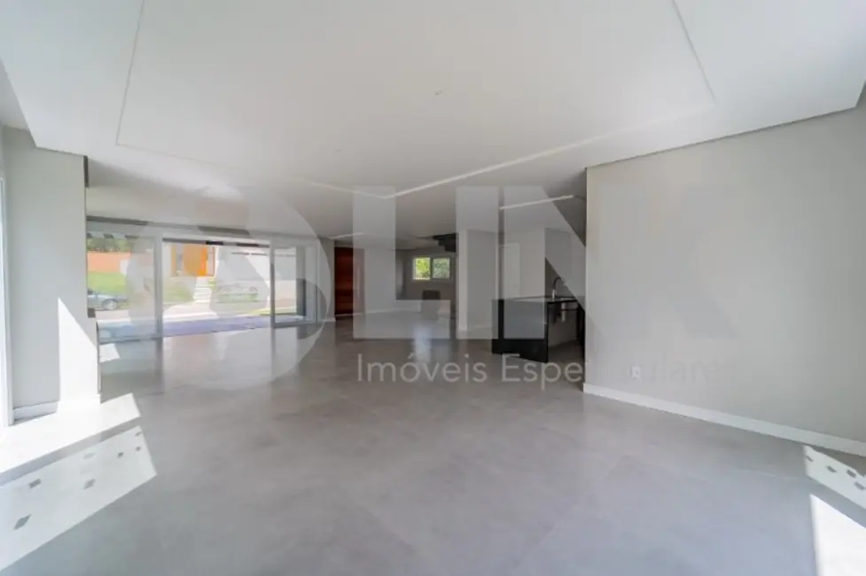 Foto 1 de Casa de Condomínio com 3 quartos à venda, 300m2 em Vila Nova, Porto Alegre - RS