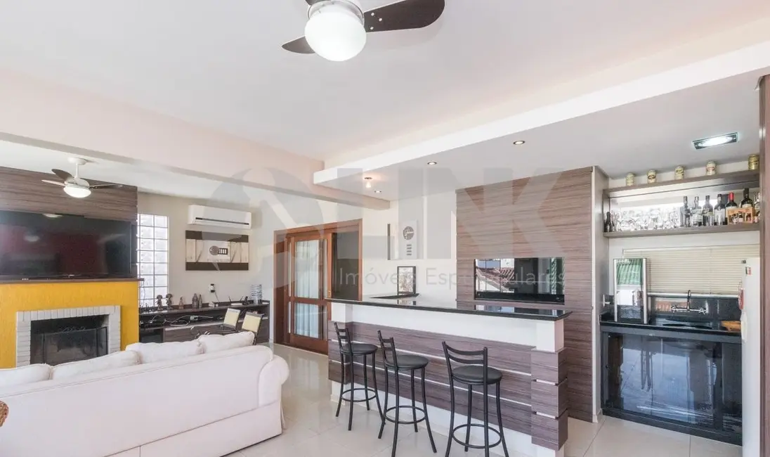 Foto 2 de Casa com 3 quartos à venda, 316m2 em Jardim Lindóia, Porto Alegre - RS