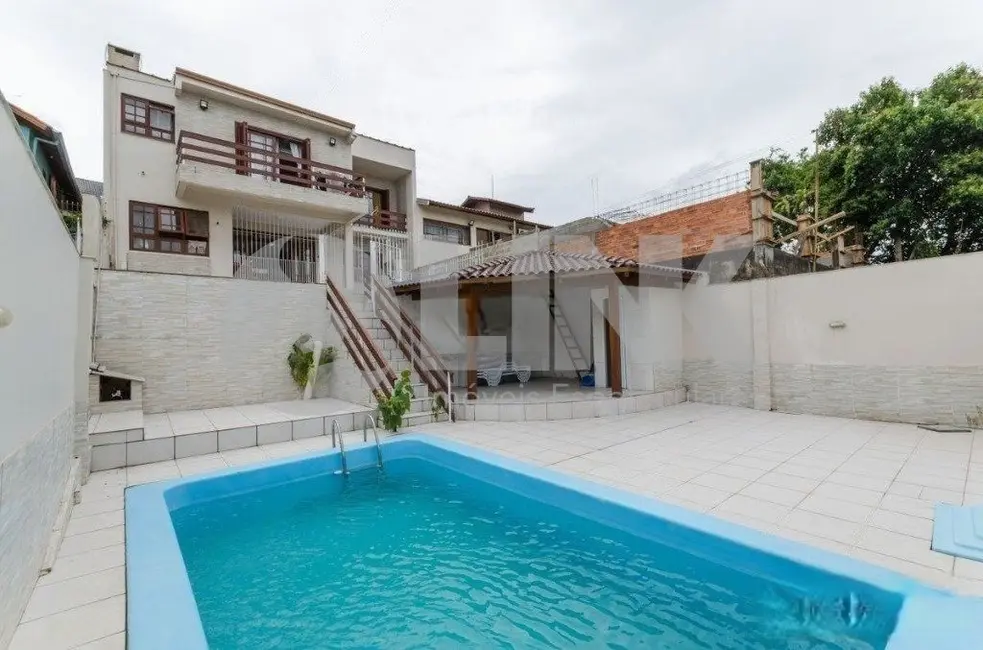 Foto 9 de Casa com 4 quartos à venda, 245m2 em Jardim Itu, Porto Alegre - RS