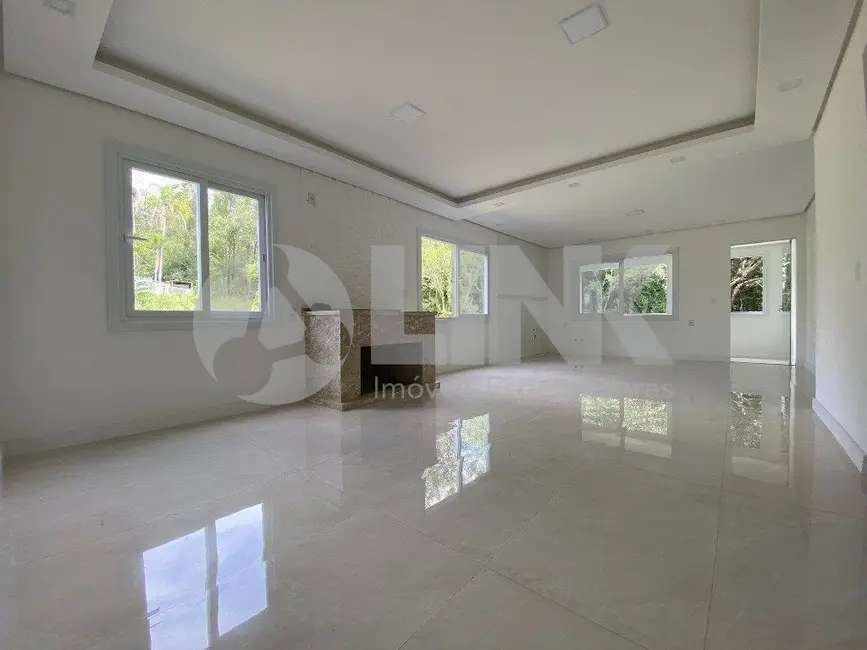 Foto 1 de Casa de Condomínio com 4 quartos à venda, 330m2 em Querência, Viamao - RS