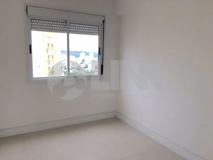 Foto 6 de Apartamento com 2 quartos à venda, 66m2 em Santo Antônio, Porto Alegre - RS