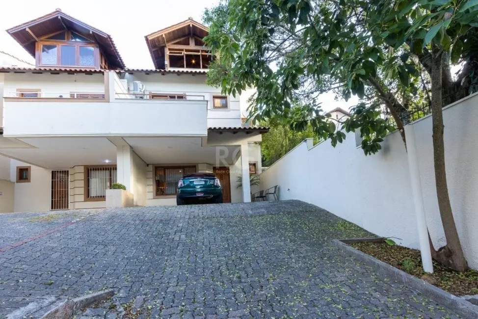 Foto 2 de Casa de Condomínio com 3 quartos à venda, 218m2 em Tristeza, Porto Alegre - RS