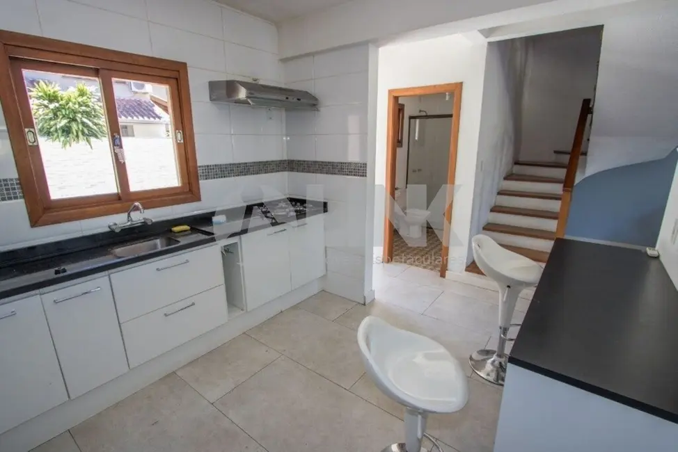 Foto 6 de Casa de Condomínio com 3 quartos à venda, 197m2 em Guarujá, Porto Alegre - RS