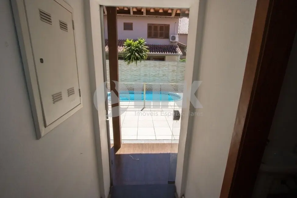 Foto 5 de Casa de Condomínio com 3 quartos à venda, 197m2 em Guarujá, Porto Alegre - RS