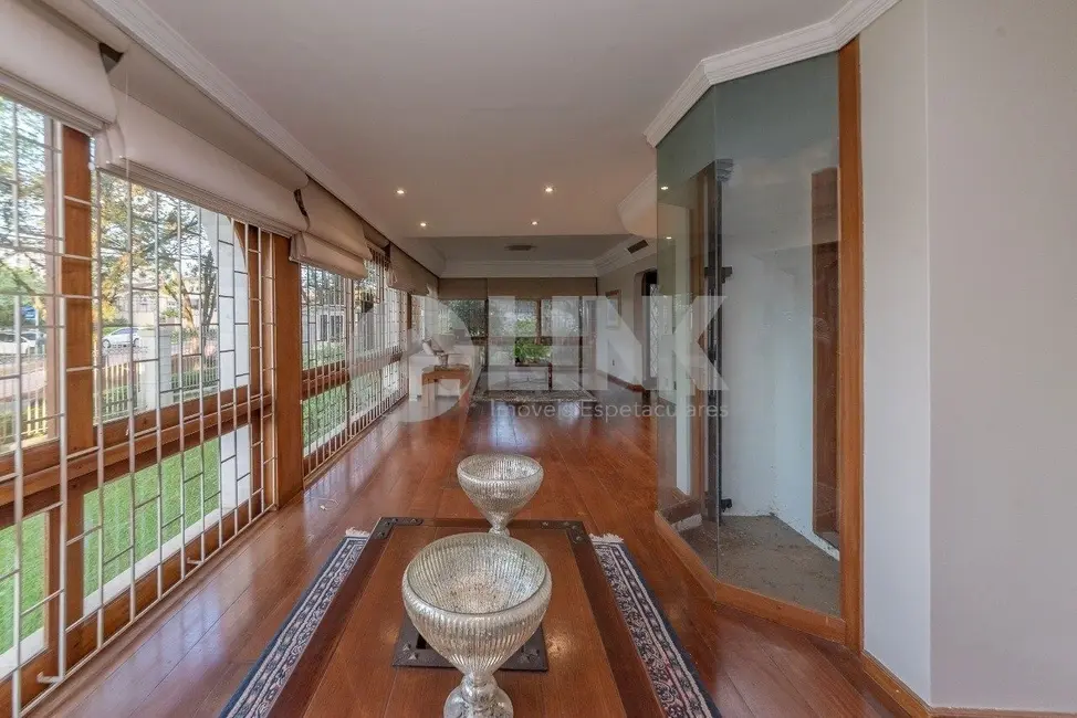 Foto 3 de Casa de Condomínio com 5 quartos à venda, 423m2 em Três Figueiras, Porto Alegre - RS