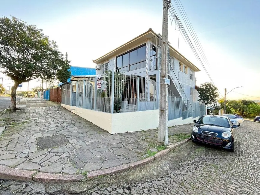 Casa com 3 quartos à venda, 360m2 em Glória, Porto Alegre - RS - imagem 2 Foto 2 de Casa com 3 quartos à venda, 360m2 em Glória, Porto Alegre - RS