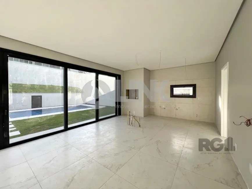 Foto 6 de Casa de Condomínio com 4 quartos à venda, 371m2 em Vila Nova, Porto Alegre - RS