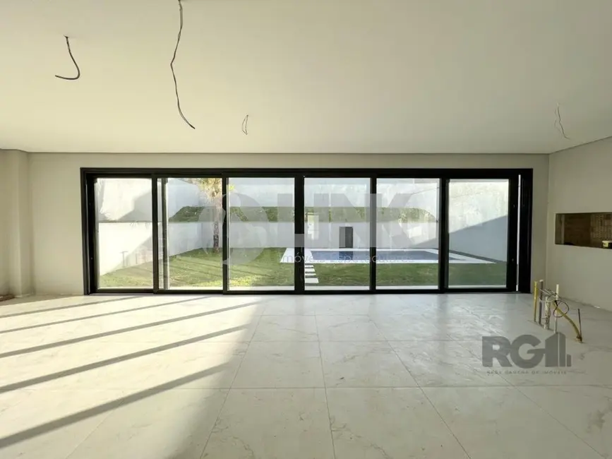 Foto 7 de Casa de Condomínio com 4 quartos à venda, 371m2 em Vila Nova, Porto Alegre - RS