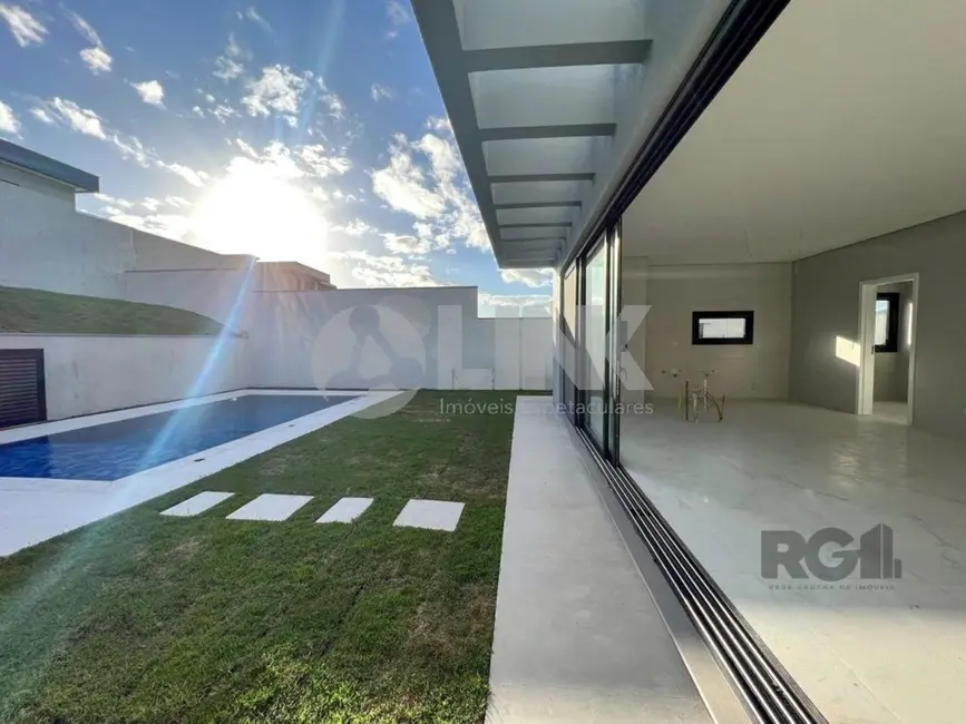 Foto 3 de Casa de Condomínio com 4 quartos à venda, 371m2 em Vila Nova, Porto Alegre - RS