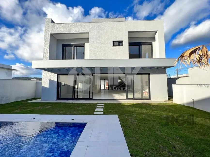 Foto 2 de Casa de Condomínio com 4 quartos à venda, 371m2 em Vila Nova, Porto Alegre - RS