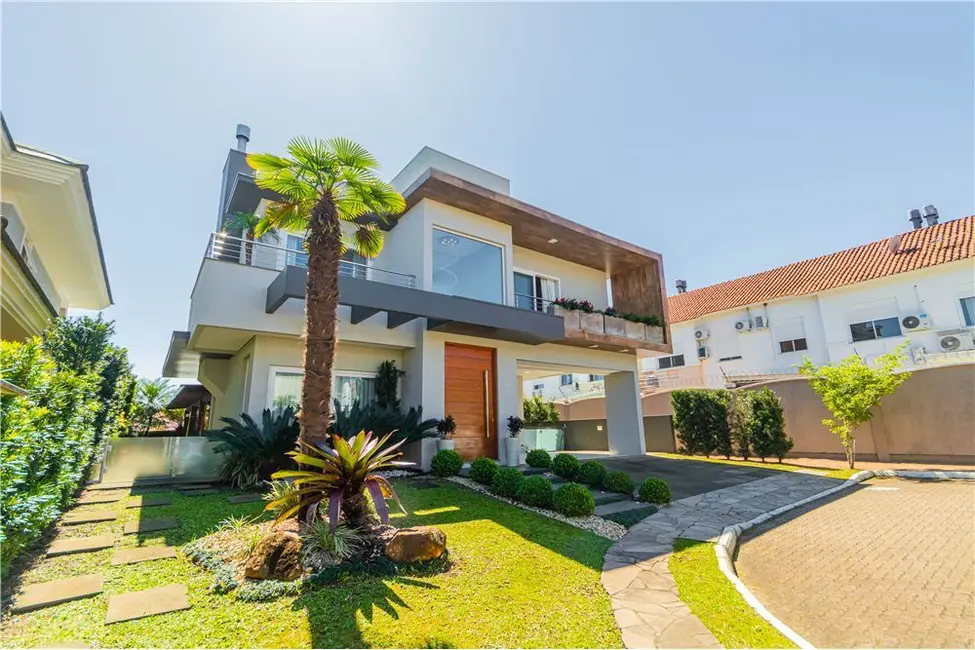 Foto 1 de Casa de Condomínio com 3 quartos à venda, 286m2 em Marechal Rondon, Canoas - RS