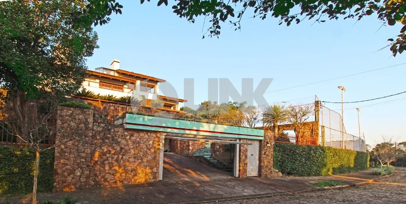 Foto 2 de Casa com 4 quartos à venda, 600m2 em Teresópolis, Porto Alegre - RS