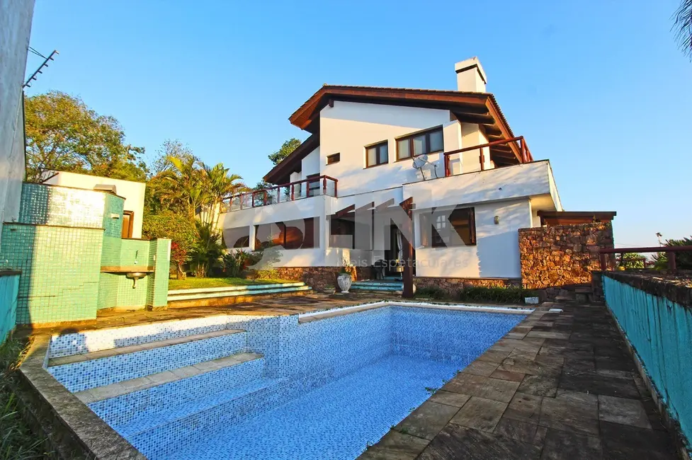 Casa com 4 quartos à venda, 600m2 em Teresópolis, Porto Alegre - RS - imagem 5 Foto 5 de Casa com 4 quartos à venda, 600m2 em Teresópolis, Porto Alegre - RS