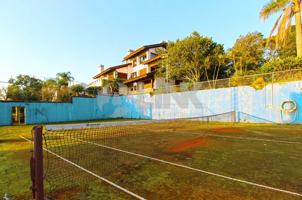 Casa com 4 quartos à venda, 600m2 em Teresópolis, Porto Alegre - RS - imagem 6 Foto 6 de Casa com 4 quartos à venda, 600m2 em Teresópolis, Porto Alegre - RS