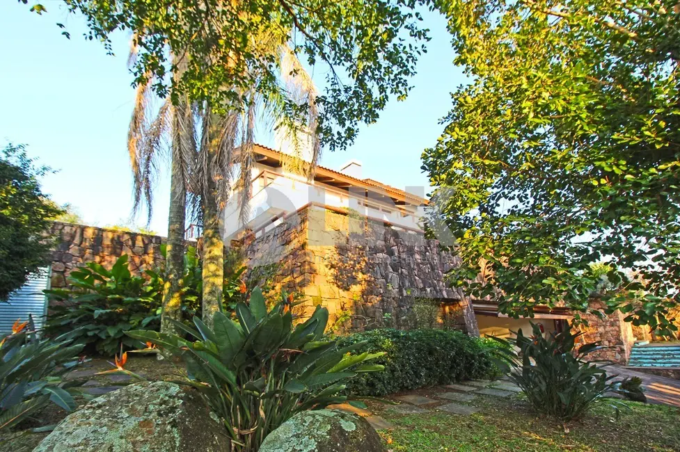 Casa com 4 quartos à venda, 600m2 em Teresópolis, Porto Alegre - RS - imagem 4 Foto 4 de Casa com 4 quartos à venda, 600m2 em Teresópolis, Porto Alegre - RS