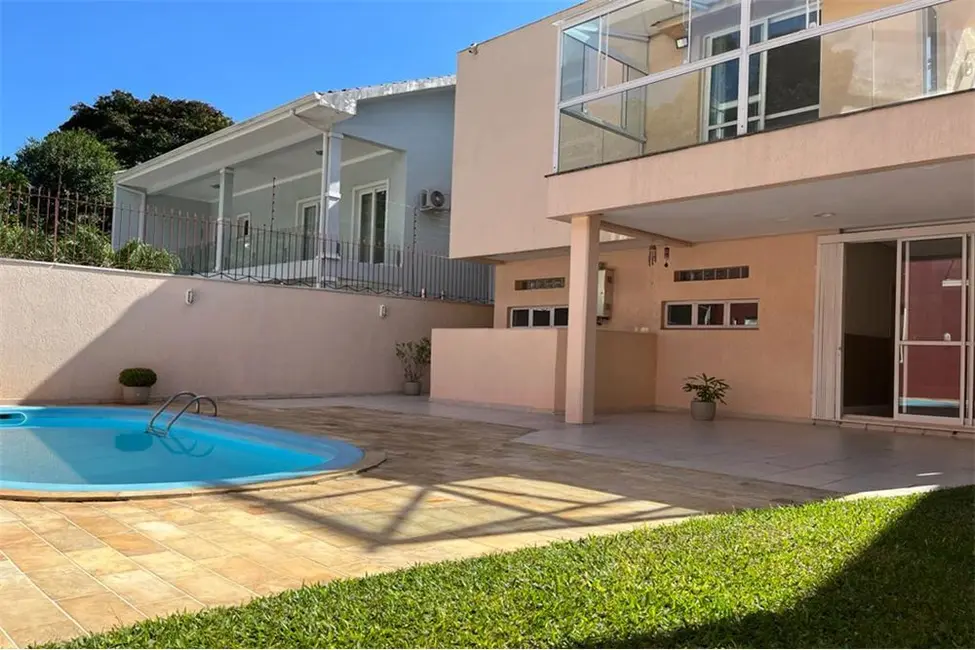 Foto 1 de Casa com 4 quartos à venda, 330m2 em Nonoai, Porto Alegre - RS