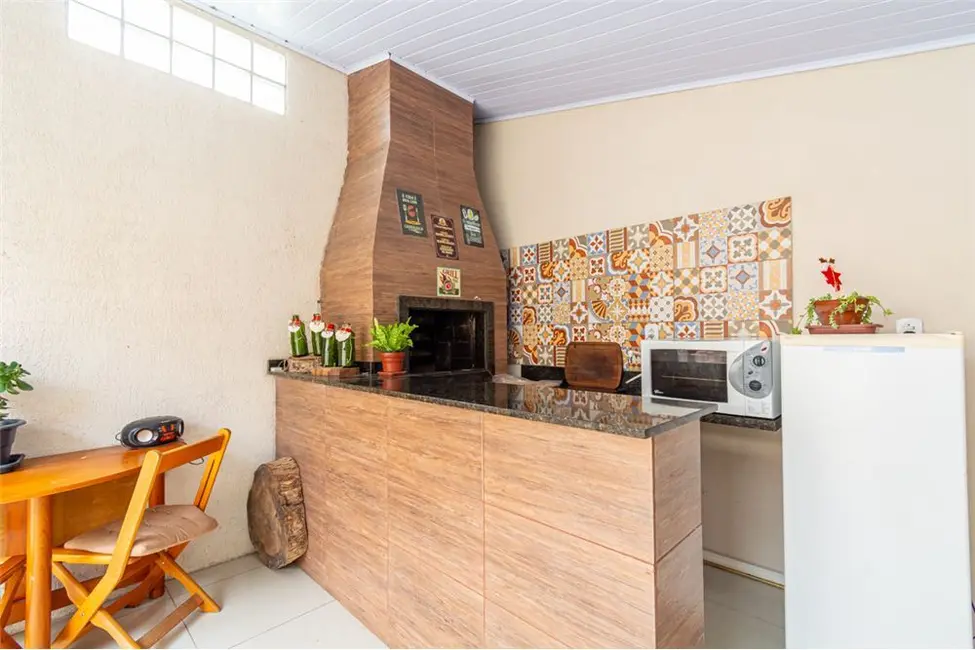Casa de Condomínio com 3 quartos à venda, 138m2 em Olaria, Canoas - RS - imagem 5 Foto 5 de Casa de Condomínio com 3 quartos à venda, 138m2 em Olaria, Canoas - RS