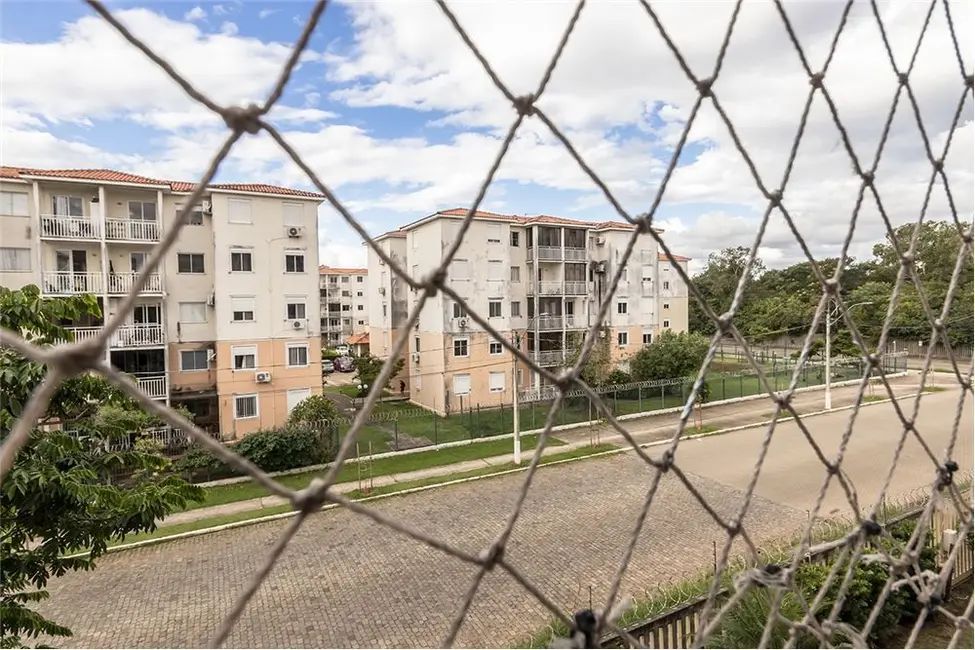 Foto 8 de Apartamento com 3 quartos à venda, 65m2 em Humaitá, Porto Alegre - RS