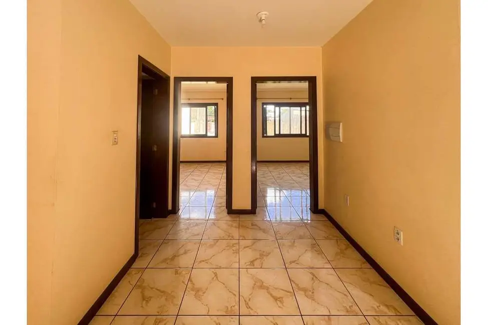 Casa com 2 quartos à venda, 125m2 em Rio Branco, Canoas - RS - imagem 5 Foto 5 de Casa com 2 quartos à venda, 125m2 em Rio Branco, Canoas - RS