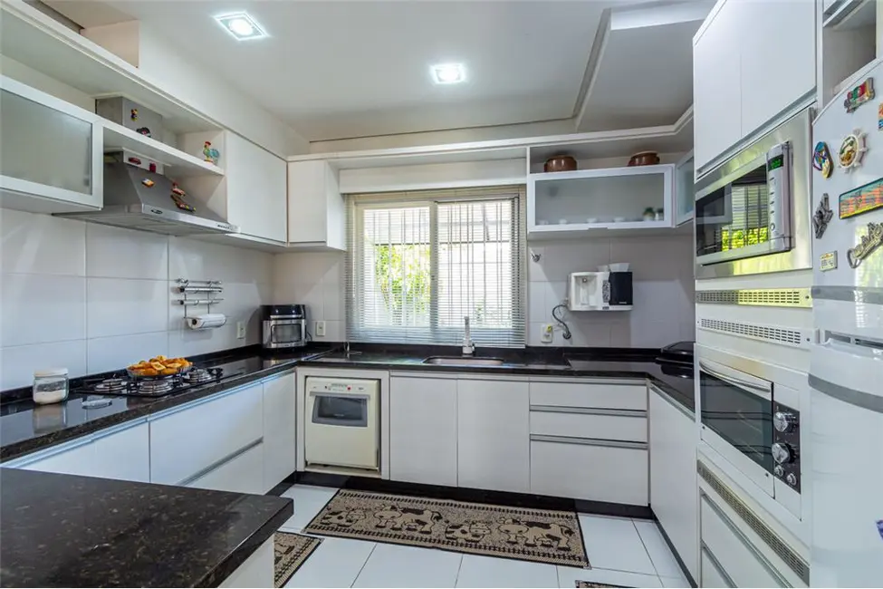 Casa com 3 quartos à venda, 162m2 em Harmonia, Canoas - RS - imagem 4 Foto 4 de Casa com 3 quartos à venda, 162m2 em Harmonia, Canoas - RS