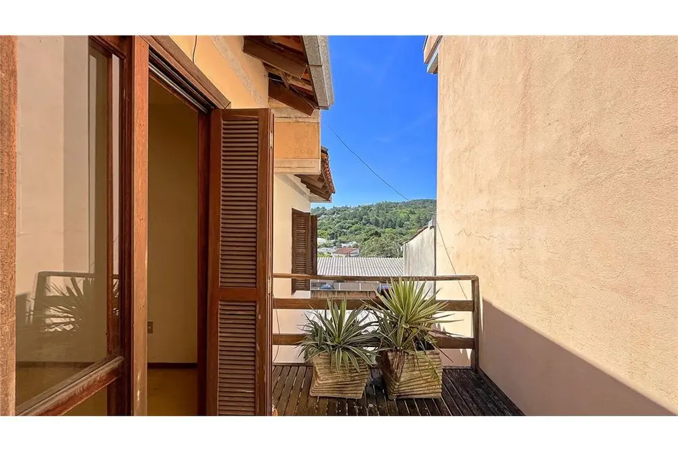 Foto 2 de Casa de Condomínio com 2 quartos à venda, 61m2 em Vila Nova, Porto Alegre - RS