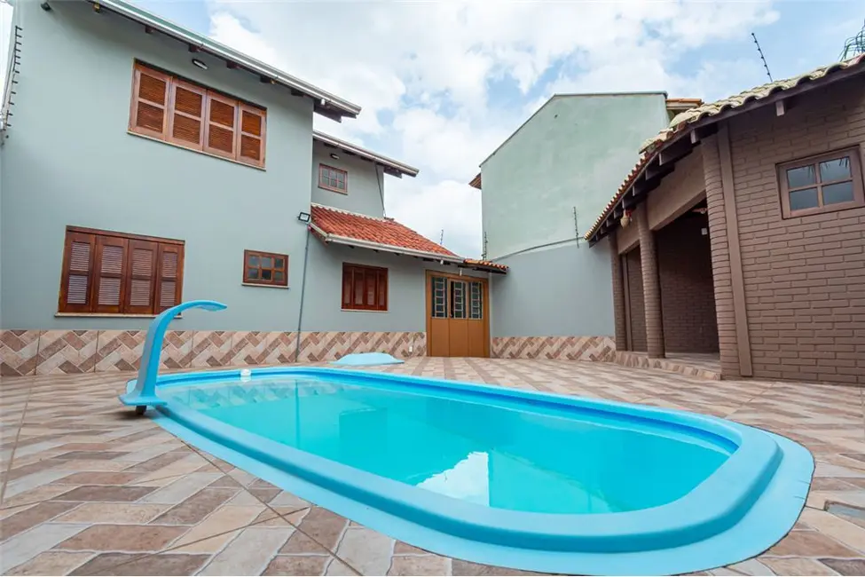 Casa com 3 quartos à venda, 132m2 em Igara, Canoas - RS - imagem 6 Foto 6 de Casa com 3 quartos à venda, 132m2 em Igara, Canoas - RS