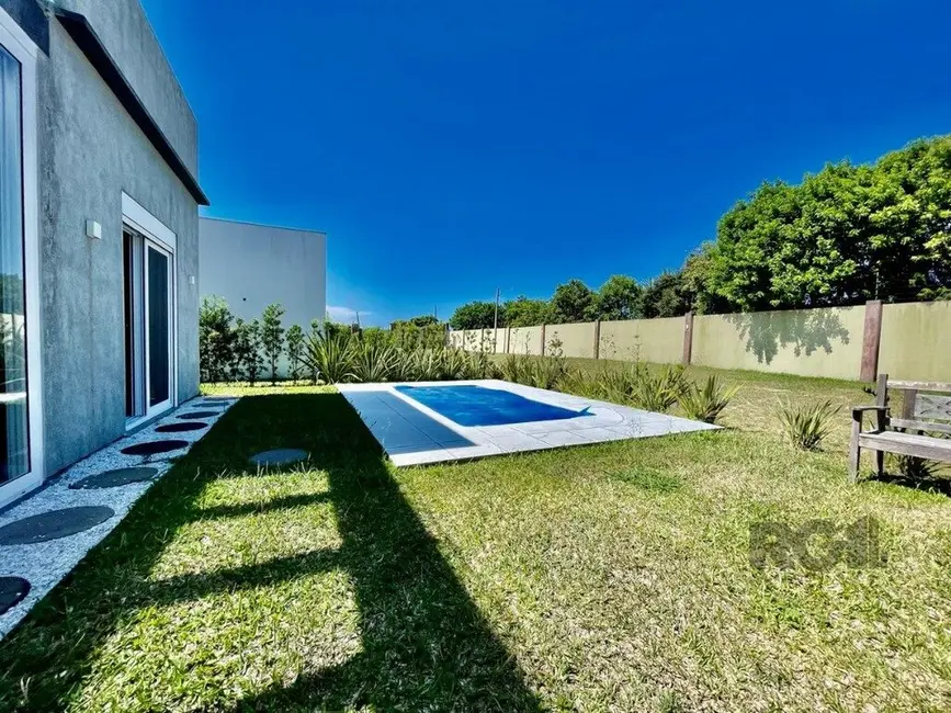 Foto 2 de Casa de Condomínio com 4 quartos à venda, 200m2 em Xangri-lá - RS