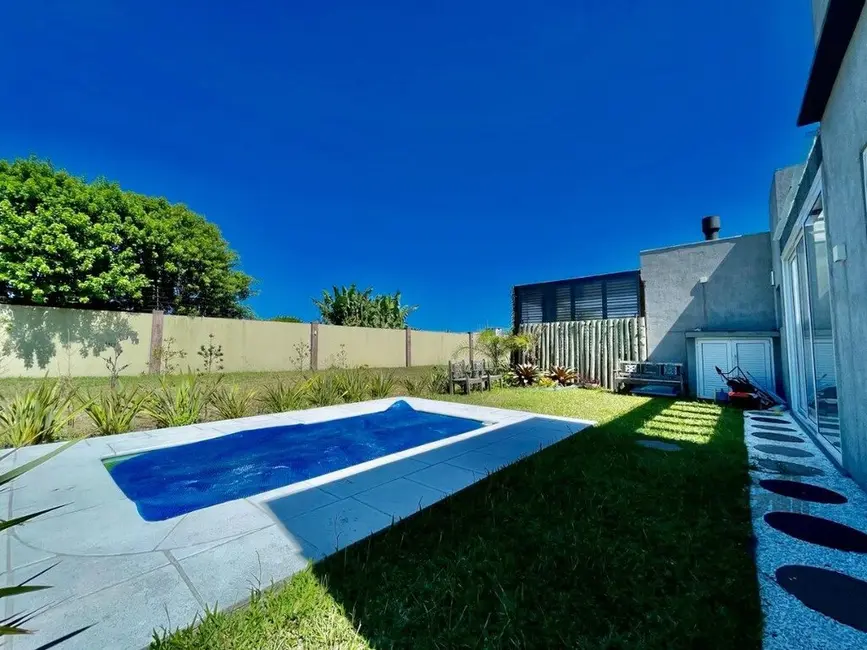 Foto 4 de Casa de Condomínio com 4 quartos à venda, 200m2 em Xangri-lá - RS