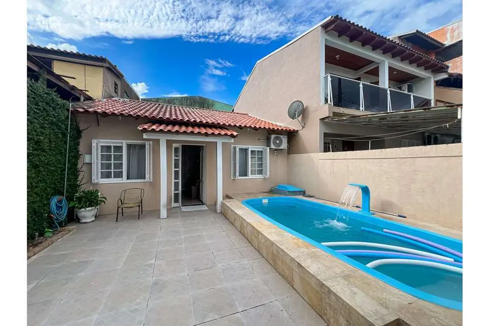 Casa com 2 quartos à venda, 56m2 em Rio Branco, Canoas - RS - imagem 1 Foto 1 de Casa com 2 quartos à venda, 56m2 em Rio Branco, Canoas - RS