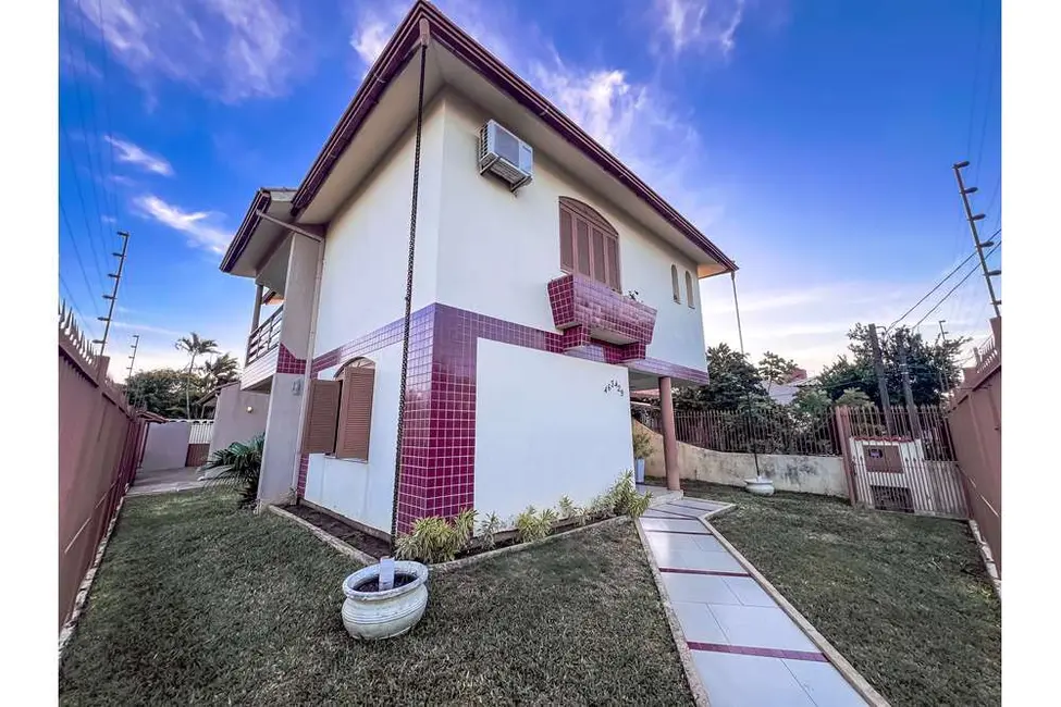 Casa com 3 quartos à venda, 256m2 em Igara, Canoas - RS - imagem 5 Foto 5 de Casa com 3 quartos à venda, 256m2 em Igara, Canoas - RS