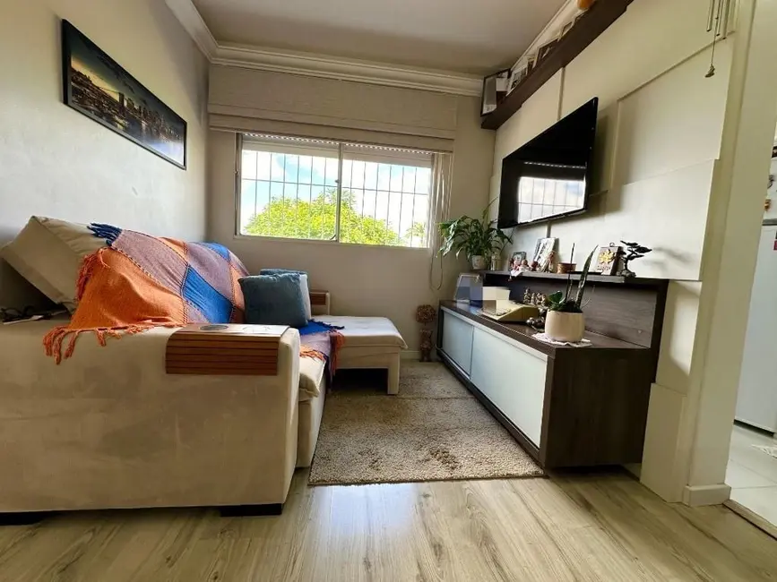 Apartamento com 1 quarto à venda, 32m2 em Santo Antônio, Porto Alegre - RS - imagem 3 Foto 3 de Apartamento com 1 quarto à venda, 32m2 em Santo Antônio, Porto Alegre - RS