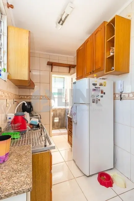 Apartamento com 2 quartos à venda, 55m2 em Independência, Porto Alegre - RS - imagem 6 Foto 6 de Apartamento com 2 quartos à venda, 55m2 em Independência, Porto Alegre - RS