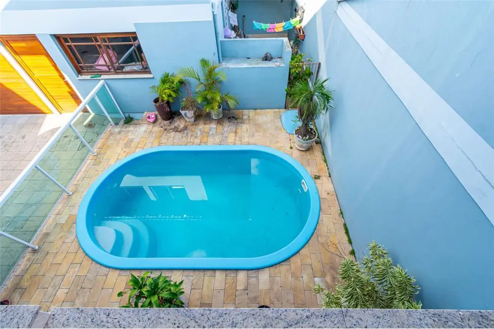 Casa com 4 quartos à venda, 270m2 em Canoas - RS - imagem 6 Foto 6 de Casa com 4 quartos à venda, 270m2 em Canoas - RS