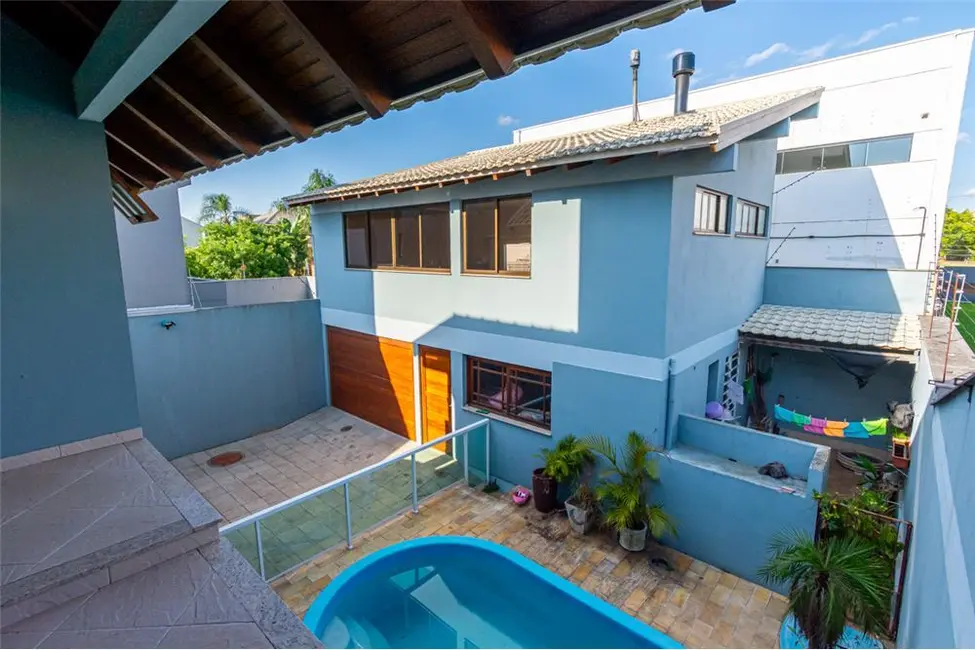 Casa com 4 quartos à venda, 270m2 em Canoas - RS - imagem 7 Foto 7 de Casa com 4 quartos à venda, 270m2 em Canoas - RS