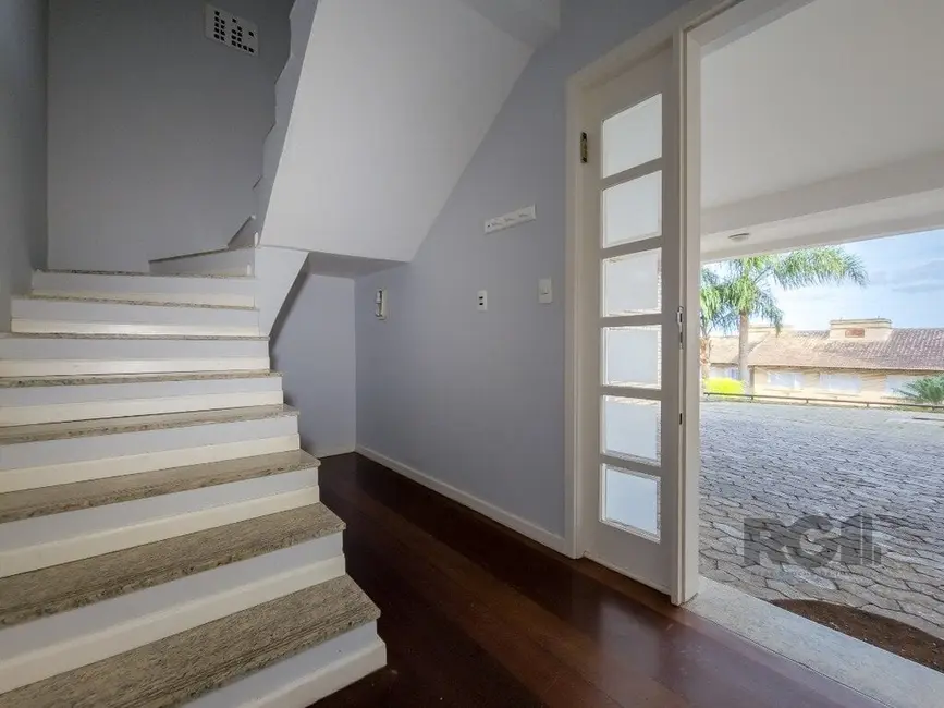 Foto 2 de Casa de Condomínio com 3 quartos à venda, 239m2 em Sétimo Céu, Porto Alegre - RS