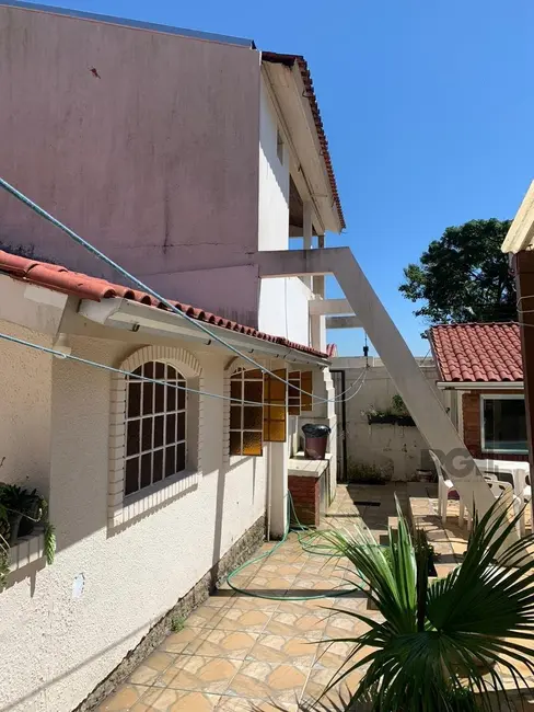 Foto 2 de Casa com 4 quartos à venda, 200m2 em Santa Tereza, Porto Alegre - RS