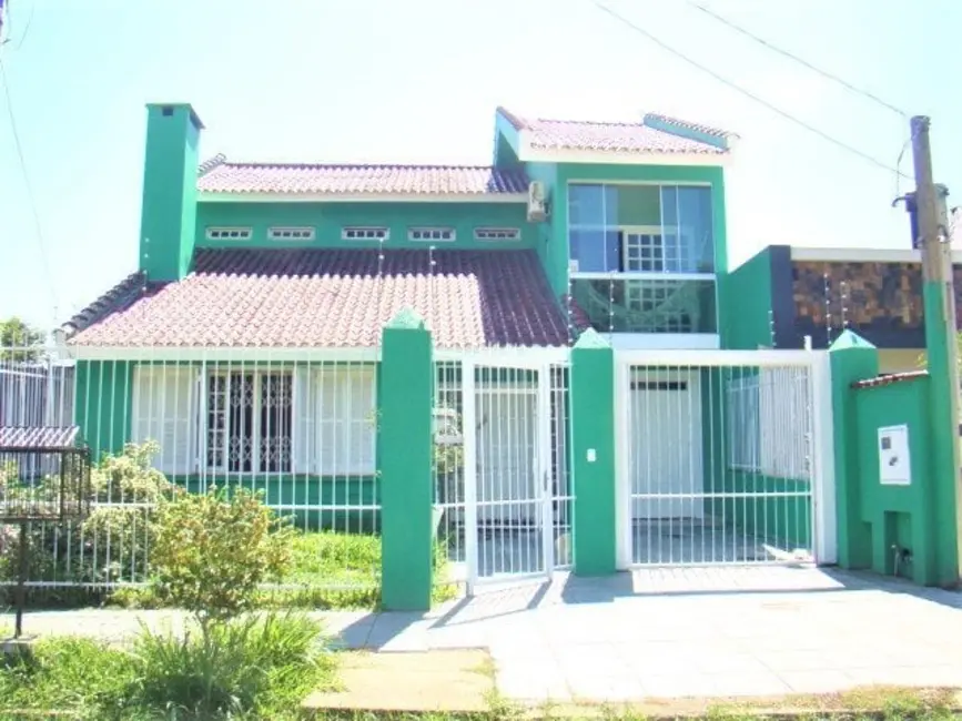 Foto 1 de Casa com 4 quartos à venda, 250m2 em Espírito Santo, Porto Alegre - RS
