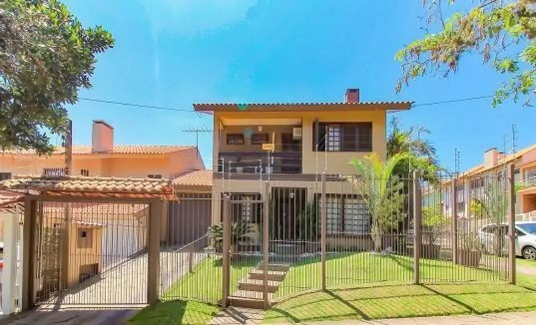 Foto 1 de Casa com 4 quartos à venda, 258m2 em Espírito Santo, Porto Alegre - RS
